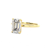 emerald cut diamond solitaire engagement ring with hidden halo
