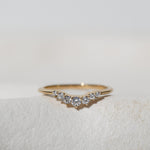 GRADUATED CROWN RING - A CURVED DIAMOND RING WITH DIAMONDS GRADUATING FROM BIGGER TO SMALLER