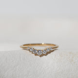 GRADUATED CROWN RING - A CURVED DIAMOND RING WITH DIAMONDS GRADUATING FROM BIGGER TO SMALLER