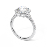 round brilliant cut diamond ring with diamond halo in platinum