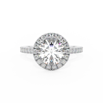 round brilliant cut diamond ring with diamond halo in platinum