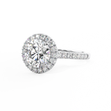 round brilliant cut diamond ring with diamond halo in platinum