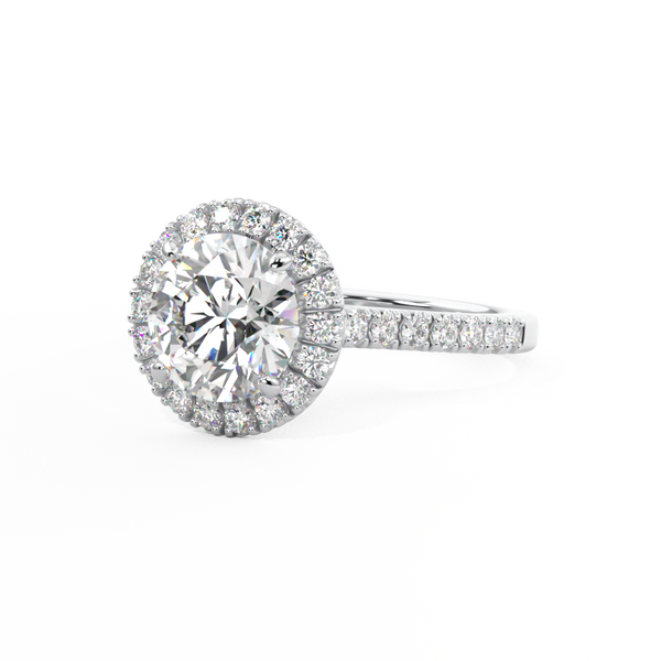 round brilliant cut diamond ring with diamond halo in platinum