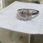 3 stone emerald cut diamond engagement ring

