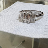 3 stone emerald cut diamond engagement ring
