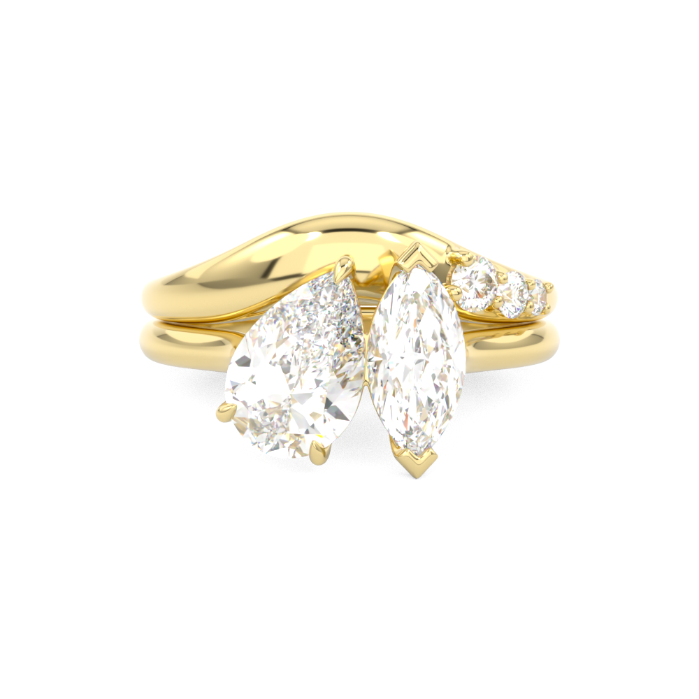 Gold curved wedding ring with diamonds around toi et moi engagement ring