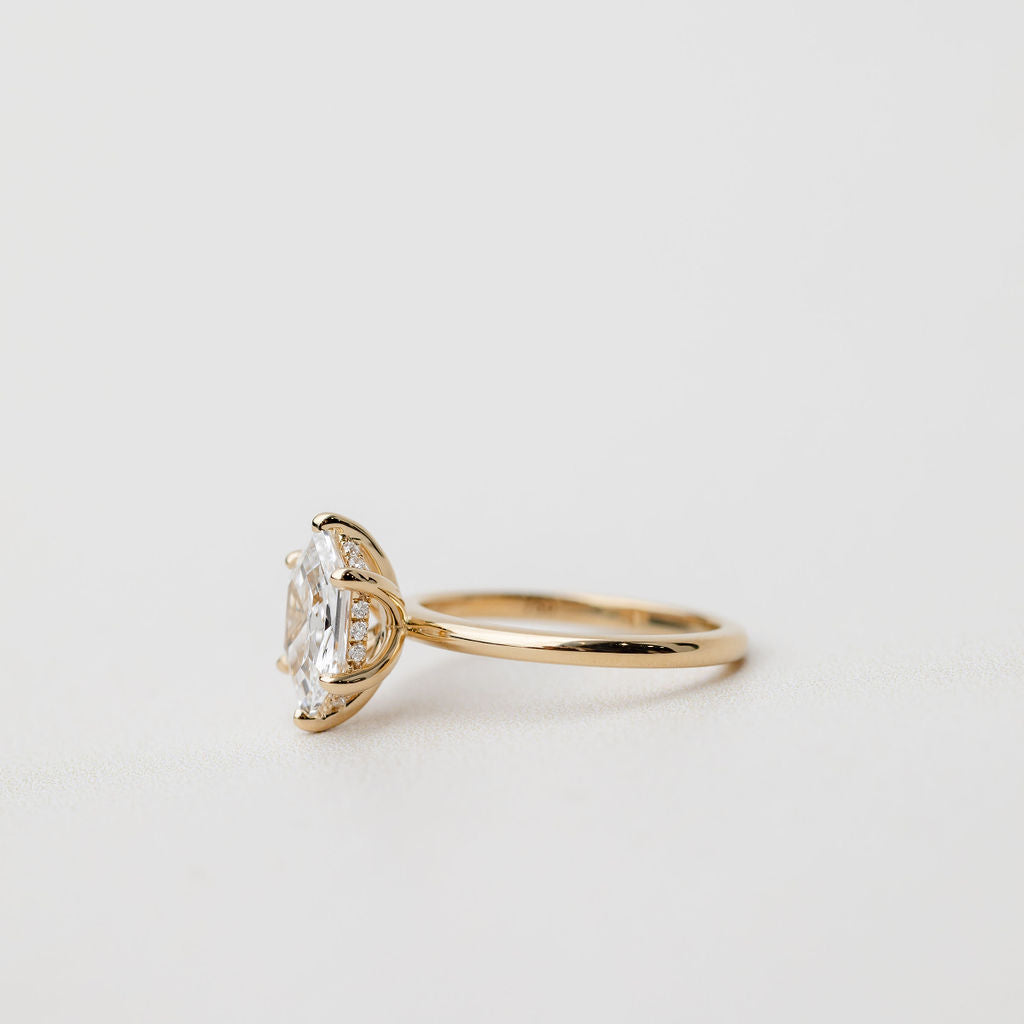 hexagonal engagement ring with hidden halo