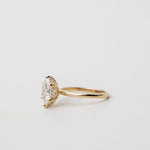 hexagonal engagement ring with hidden halo