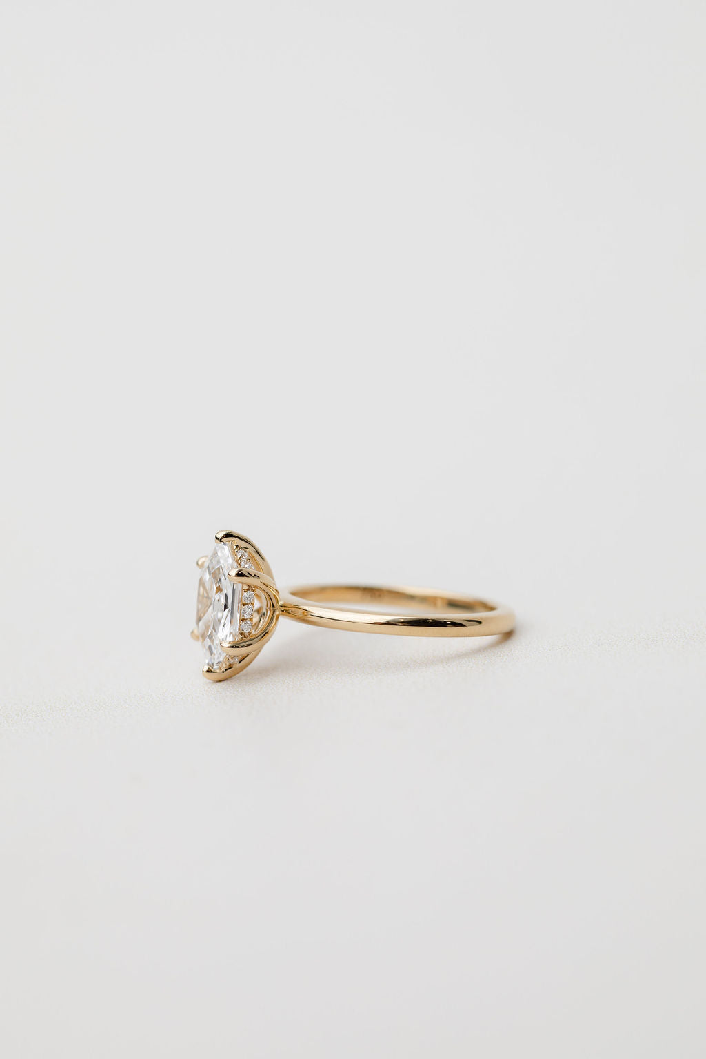 hexagonal engagement ring with hidden halo