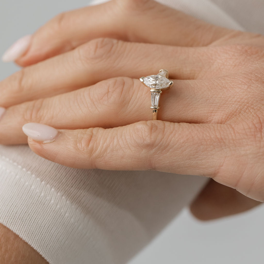 Trilogy ring with marquise centre stone