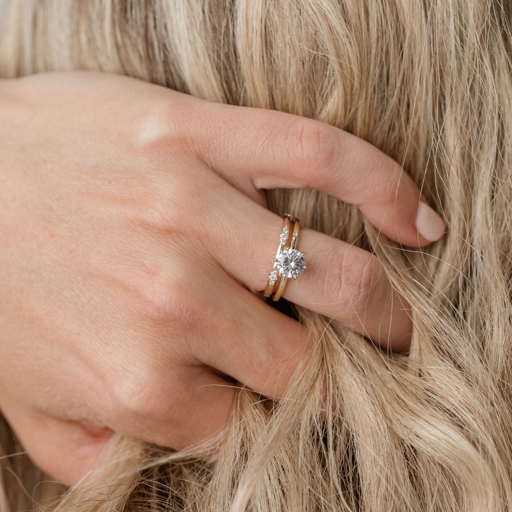 Yellow Gold diamond solitaire engagement ring with beautiful gold band small diamonds