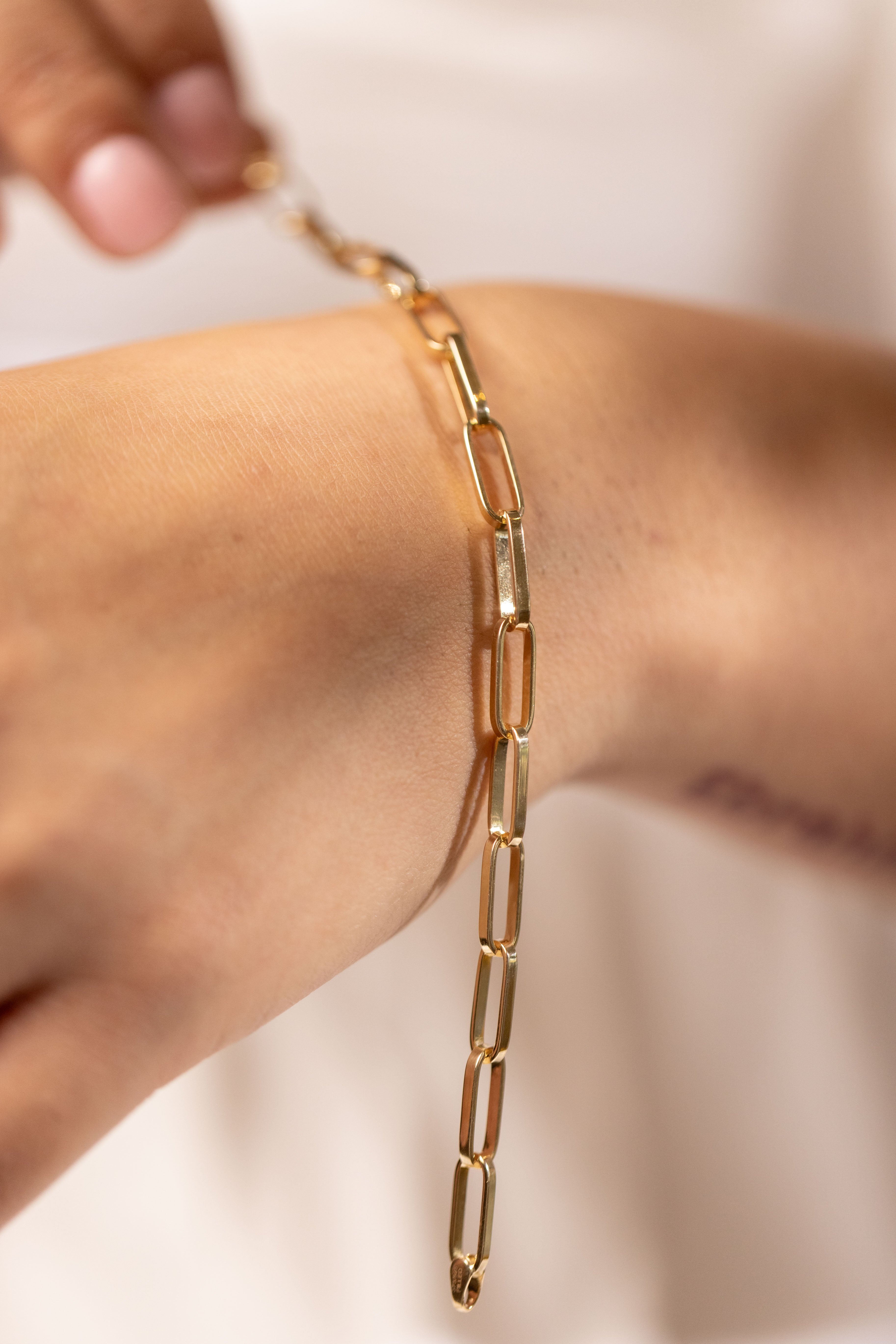 Large link paperclip bracelet yellow gold