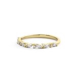 Marquise and round diamond wedding band in yellow gold 