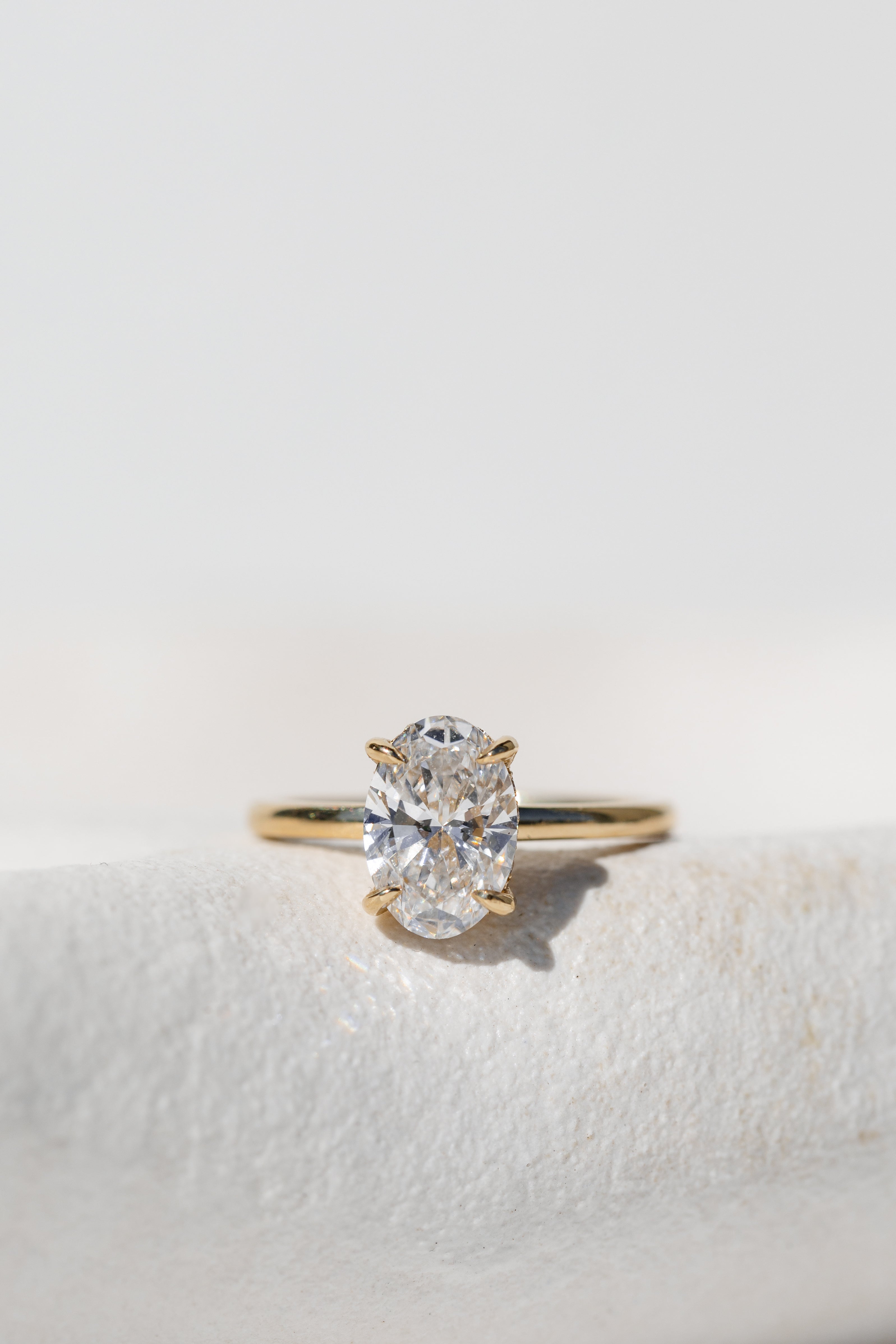 Oval Cut Diamond Solitaire with Hidden Halo