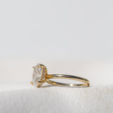 OVAL CUT DIAMOND SOLITAIRE WITH HIDDEN HALO GOLD BAND