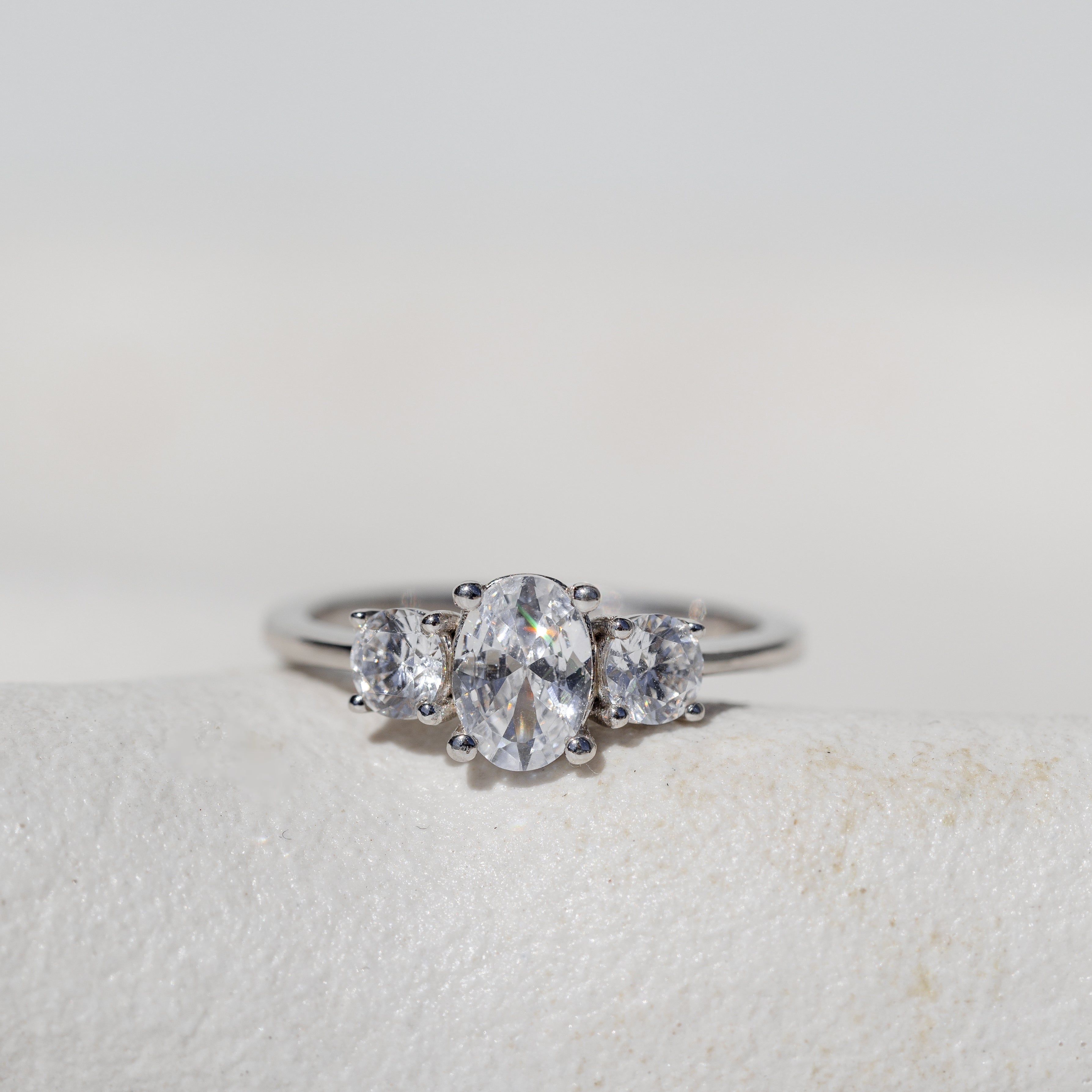 OVAL TRILOGY ENGAGEMENT RING
