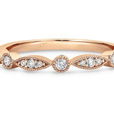Odette Vintage wedding ring with round and marquise shape diamonds 