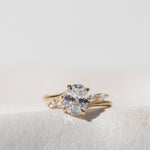 Oval Cut Diamond Engagement Ring with Marquise Cut Side Stones
