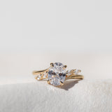 Oval Cut Diamond Engagement Ring with Marquise Cut Side Stones