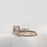 Oval Cut Diamond Ring with Marquise Cut Side Stones