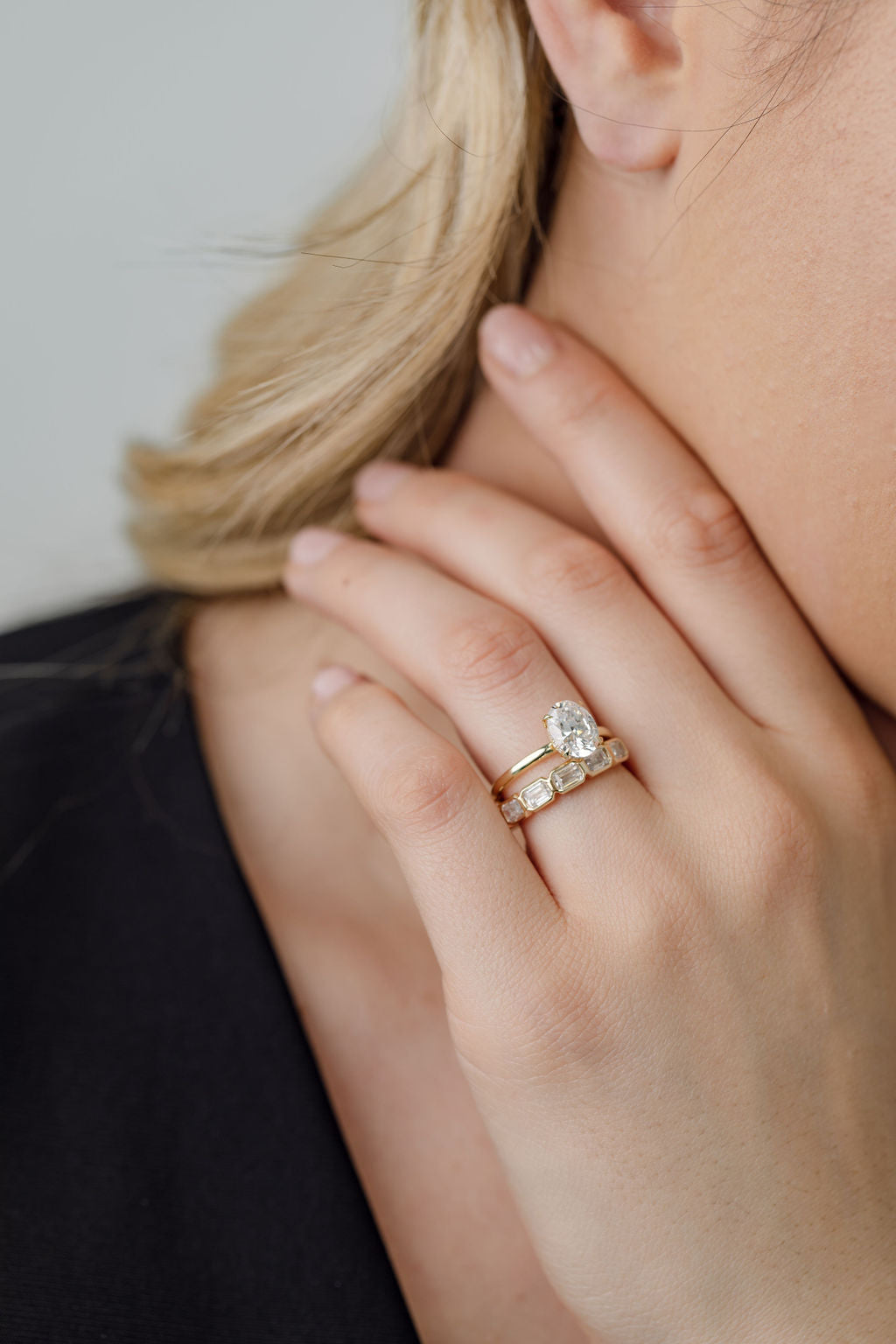 Oval Cut Diamond Solitaire engagement ring with bezel set emerald cut diamond wedding ring