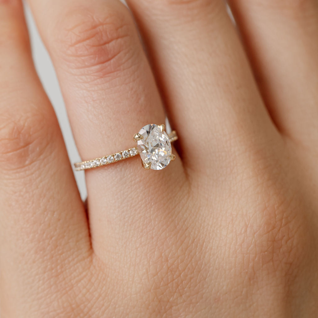 Oval Cut Diamond engagement ring with diamond band