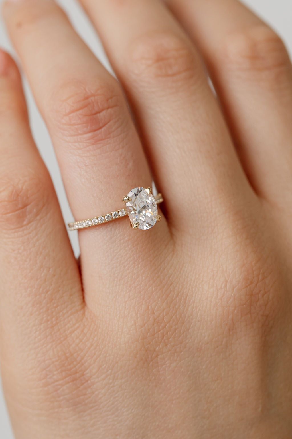 Oval Cut Diamond engagement ring with diamond band
