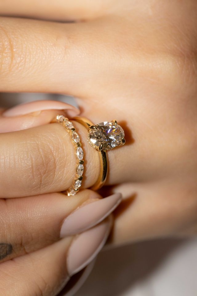 Oval Diamond Solitaire with Hidden Halo