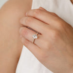 Oval Legacy engagement ring with diamonds in the band