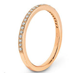 Pave set diamonds and a millgrain edge wedding ring  rose gold 