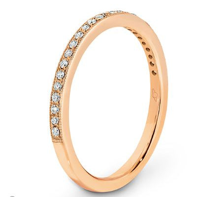 Pave set diamonds and a millgrain edge wedding ring  rose gold 