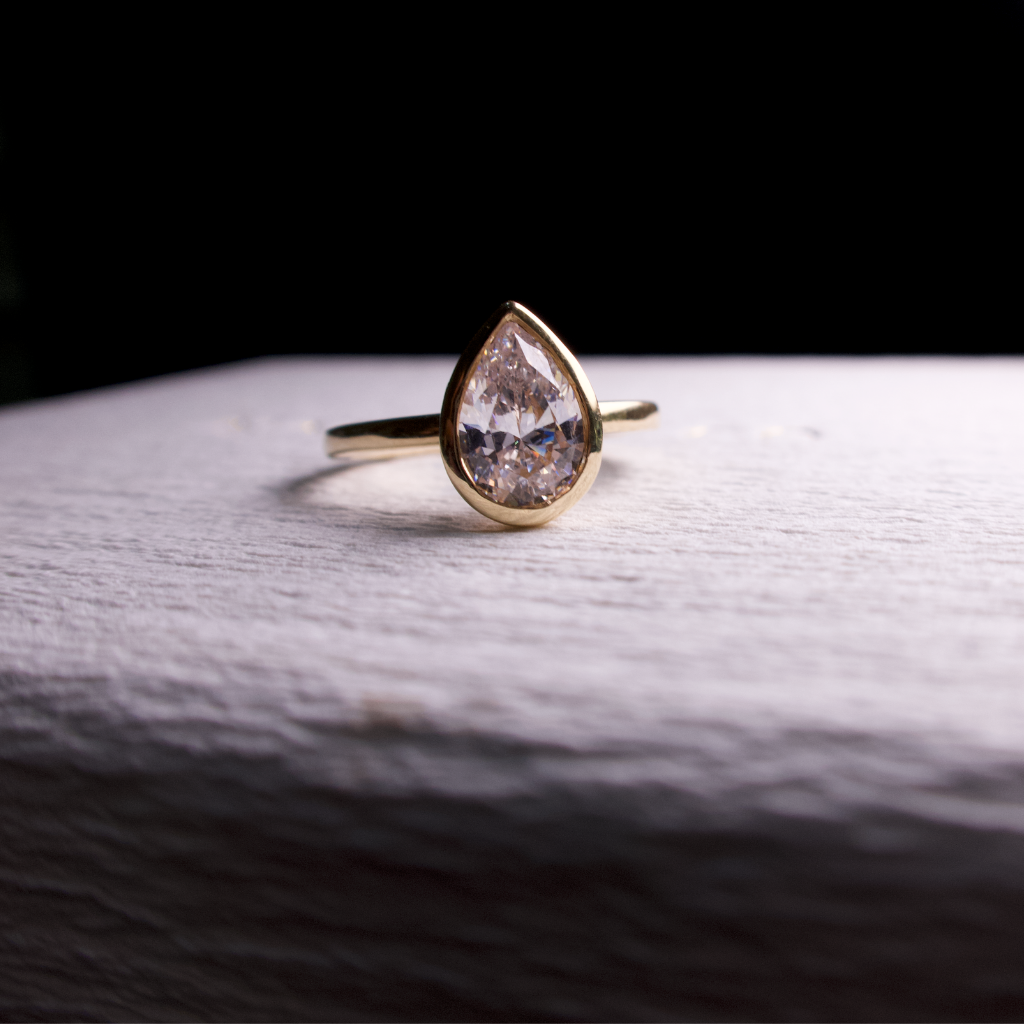 Pear cut diamond ring