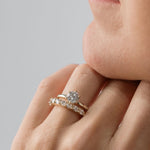 Round Brilliant Cut Solitaire engagement ring with marquise cut diamond wedding ring