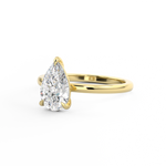 Side profile of 3 claw pear cut diamond solitaire engagement ring