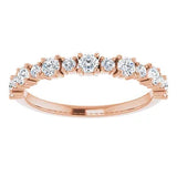 Statement diamond eternity ring in rose gold with two sized diamonds 