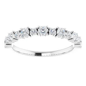 Statement diamond eternity ring in white gold with two sized diamonds 