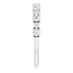 Statement diamond eternity ring in white gold with two sized diamonds 2