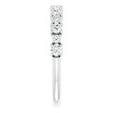 Statement diamond eternity ring in white gold with two sized diamonds 2