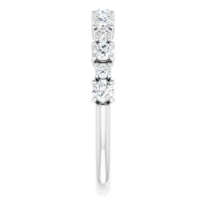 Statement diamond eternity ring in white gold with two sized diamonds 2