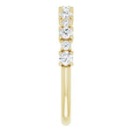 Statement diamond eternity ring in yellow gold with two sized diamonds 