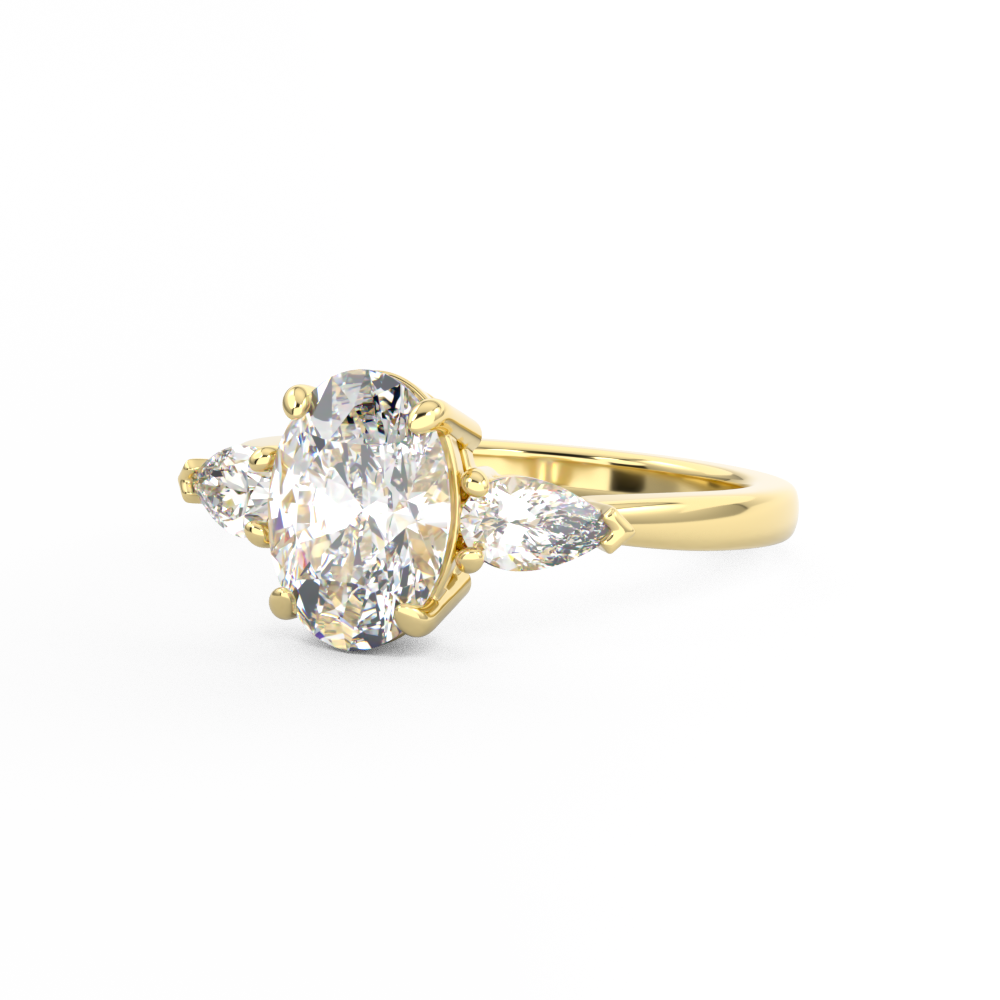 Three Stone Trilogy Diamond engagement ring with oval cut diamond centre stone and pear cut diamond side stones