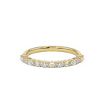 Tiny dancer half set diamond ring featuring marquise and round diamonds 