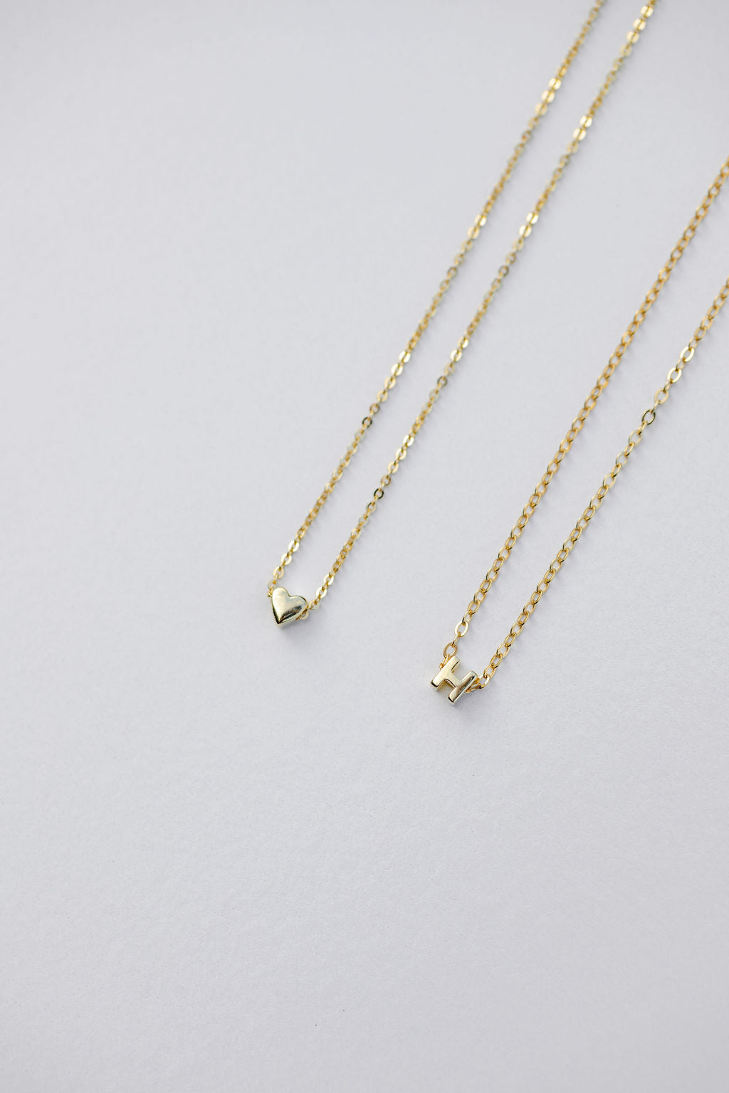 Tiny heart pendant and letter pendant