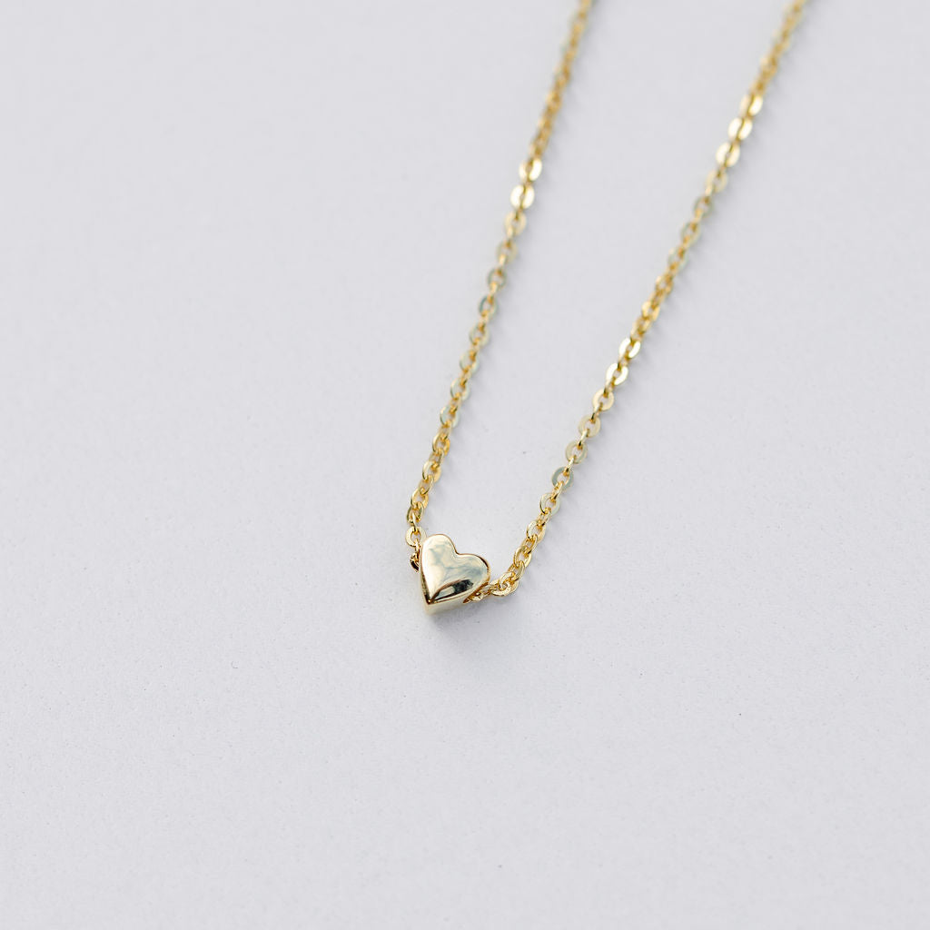 Tiny heart pendant necklace in yellow gold 