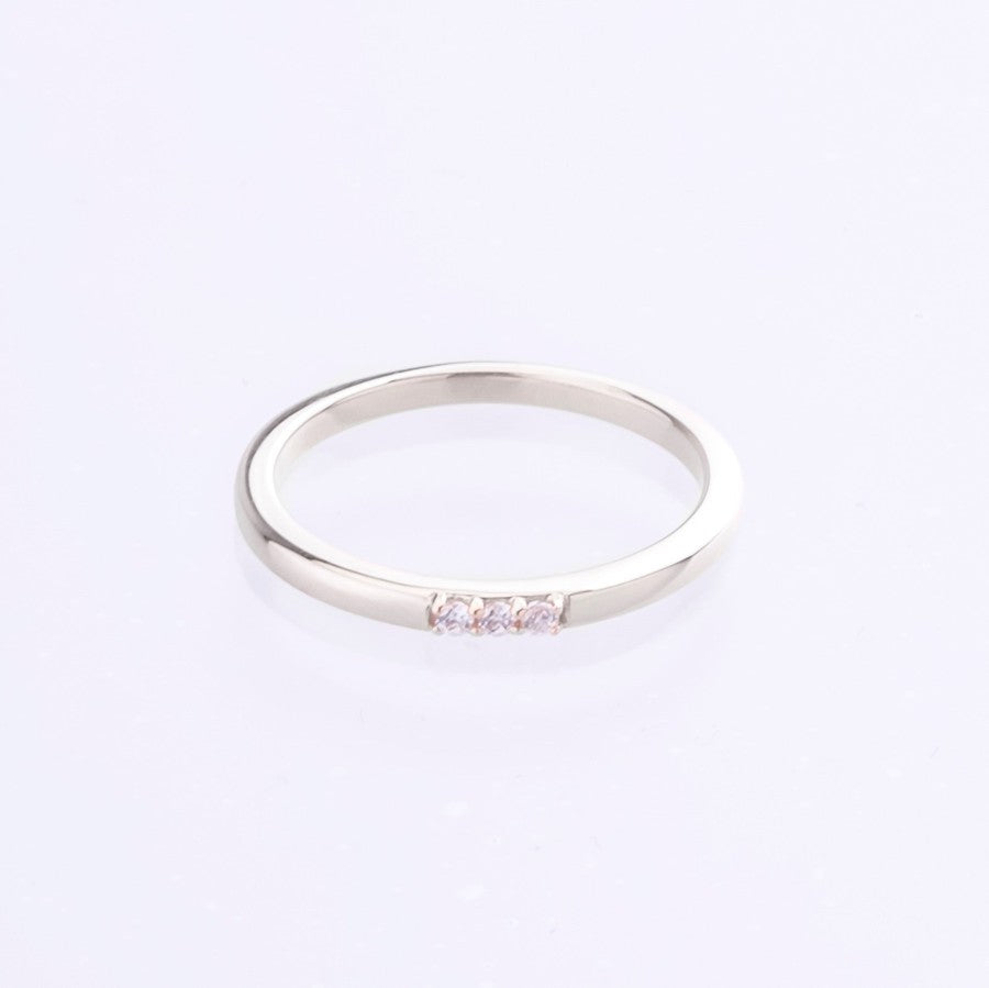 Trilogy diamond set ring in white gold 