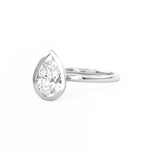 White Gold Pear Cut Diamond Solitaire Bezel Set