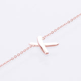 X bracelet rose gold 