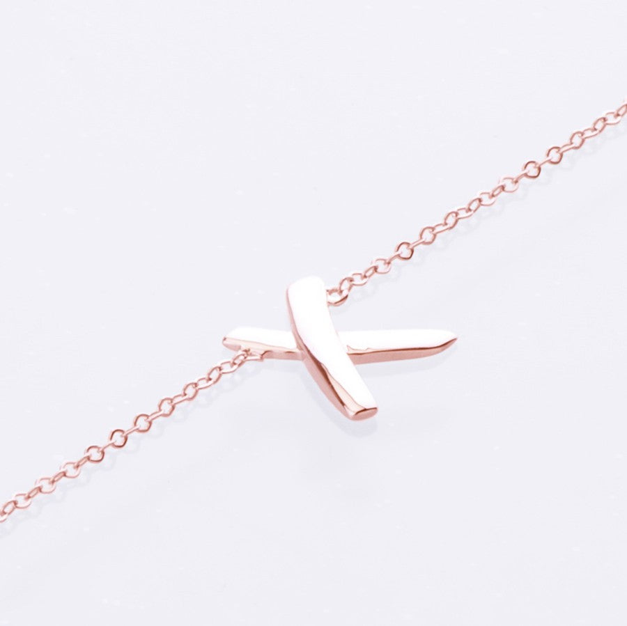 X bracelet rose gold 