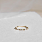 Yellow gold diamond ring with marquise diamonds and round diamonds