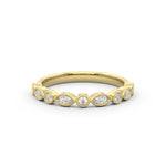 alternating round and marquise diamond ring with a millgrain edge finish